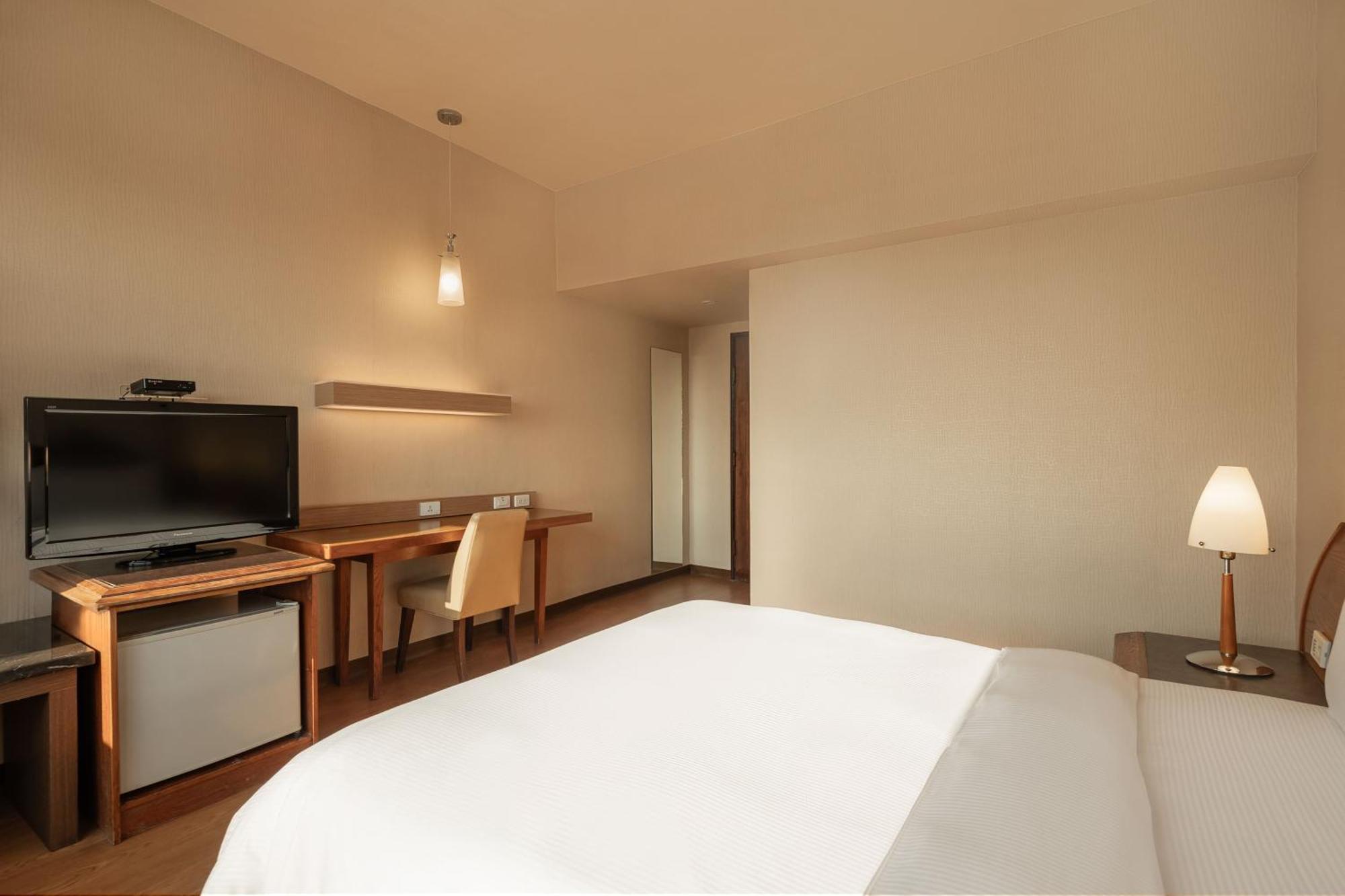 Kindness Hotel Wu-Jia Kaohsiung Quarto foto